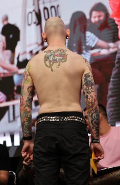 Krakow, Poland -  June 11, 2022: Unidentified  participant at 15th Tattoofest Convention in Cracow. One of the most prestigious tattoo festivals. 