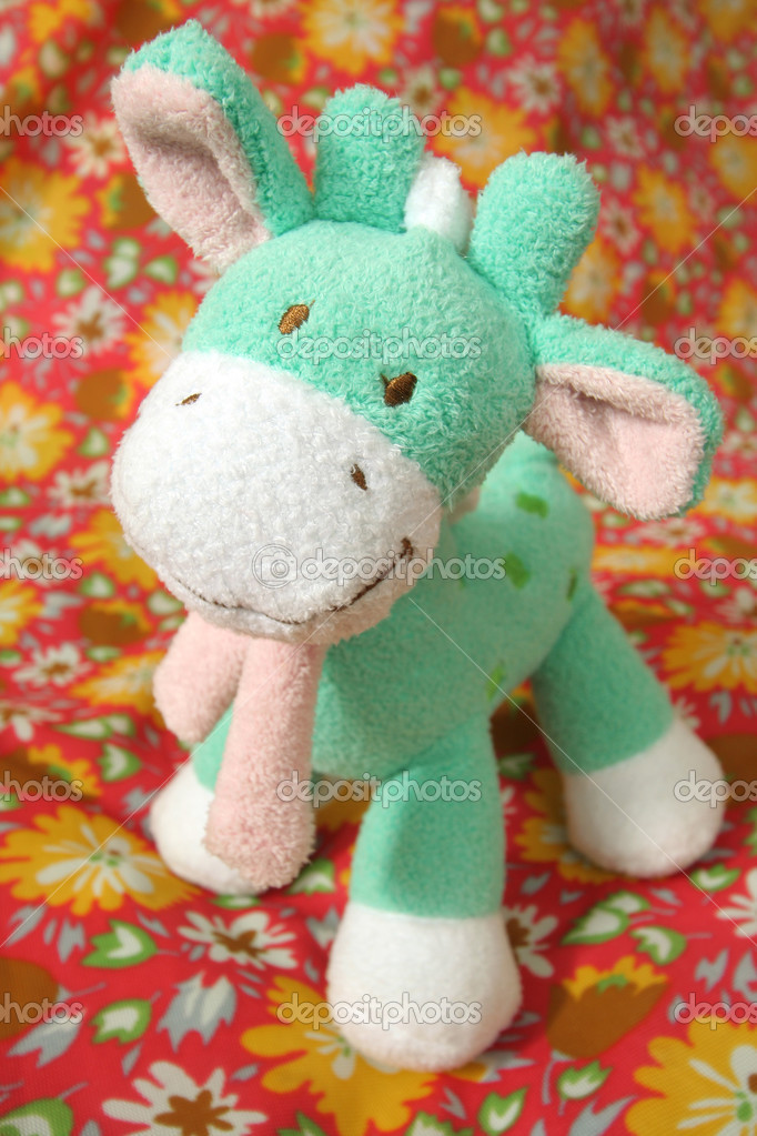 green giraffe stuffed animal