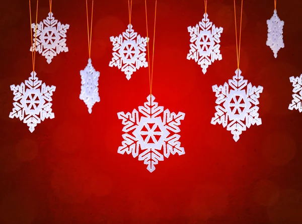 White Snowflakes on the Red Background — Stock Photo, Image