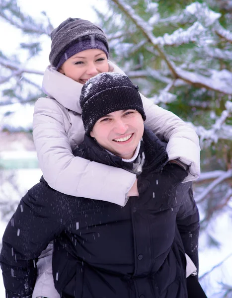 Young Beautiful Couple Taking Fun and Smiling Outdoors in Winter Stock Image