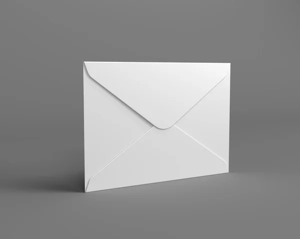 Bílá poštovní obálky na šedém pozadí — Stock fotografie