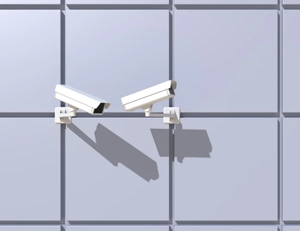 Überwachungskamera an der Fassade des Gebäudes angebracht — Stockfoto