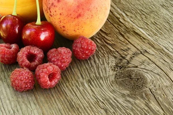 Ripe Sweet Berries and Fruits on the Wooden Table — Stock Photo, Image