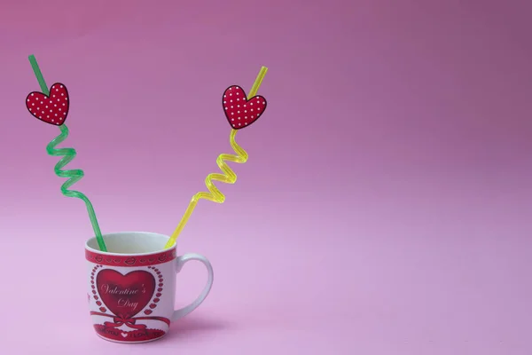 Two Crooked Straws Hearts Them Love Cup Pink Background Minimalistic — Stock Photo, Image