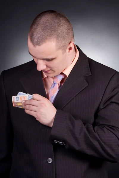 Businessman with money — Stock Photo, Image