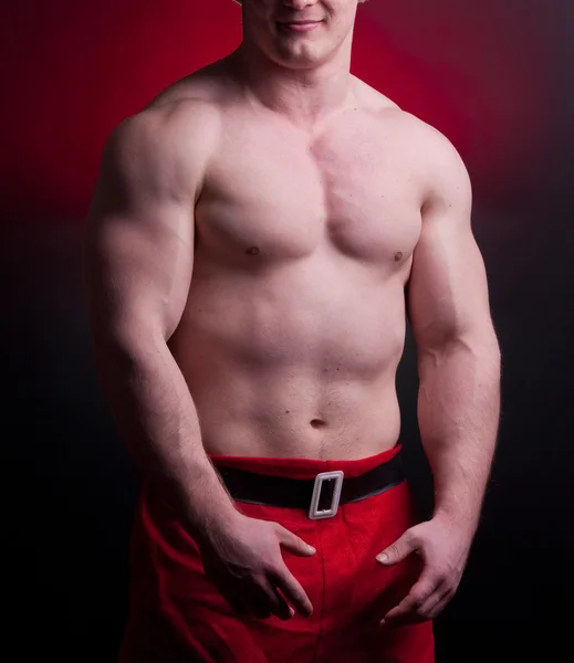 Muscular santa claus — Stock Photo, Image