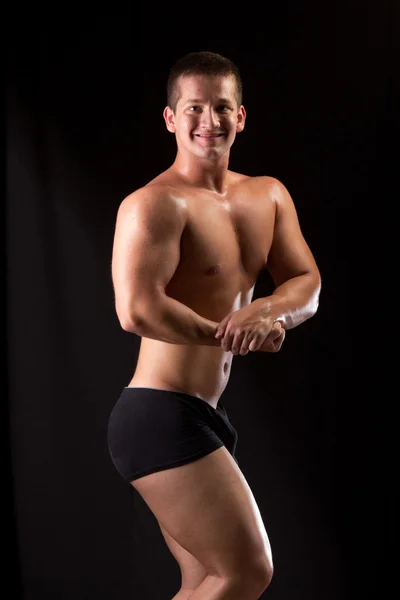 Bodybuilder posing — Stock Photo, Image