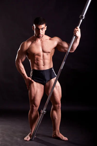 Young bodybuilder posing — Stock Photo, Image