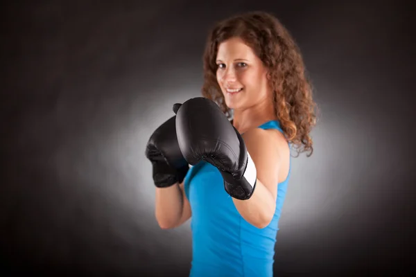 Beautiful sporty woman with box gloves — Stock Photo, Image