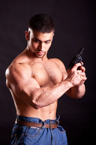 Silah ile vücut geliştirmeci — Stok fotoğraf