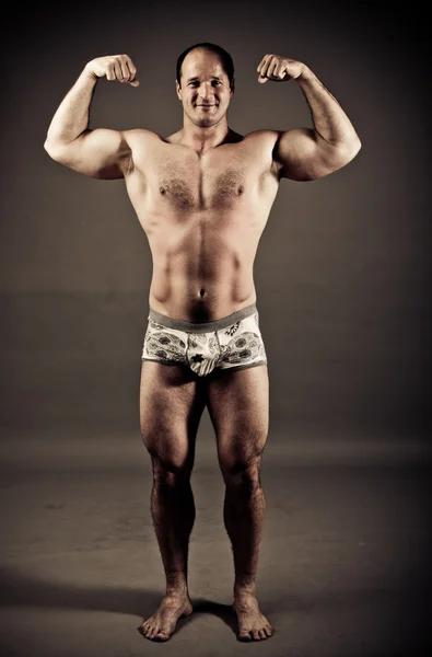 Bodybuilder posing — Stock Photo, Image