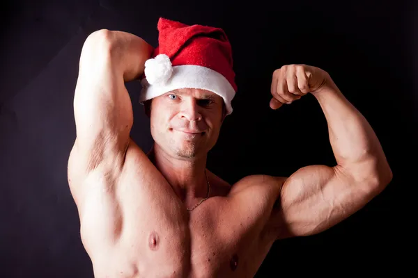 Muskulöser Weihnachtsmann — Stockfoto