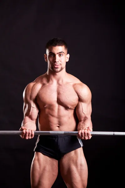 Giovane bodybuilder traininig — Foto Stock