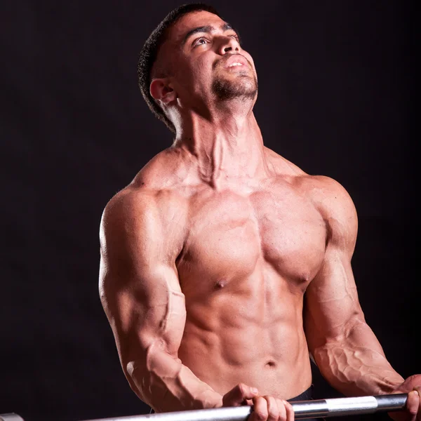 Jonge bodybuilder traininig — Stockfoto