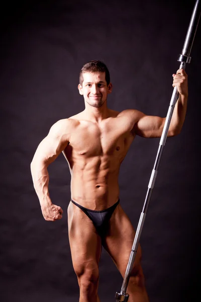 Young bodybuilder traininig — Stock Photo, Image