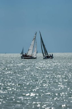 TIHANY - JULY 14 : Sailing boats compete on 54.th Kekszalag championship at the Lake Balaton on 14 July 2022 in Tihany, Hungary.