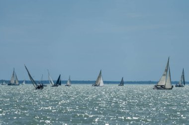 TIHANY - JULY 14 : Sailing boats compete on 54.th Kekszalag championship at the Lake Balaton on 14 July 2022 in Tihany, Hungary.