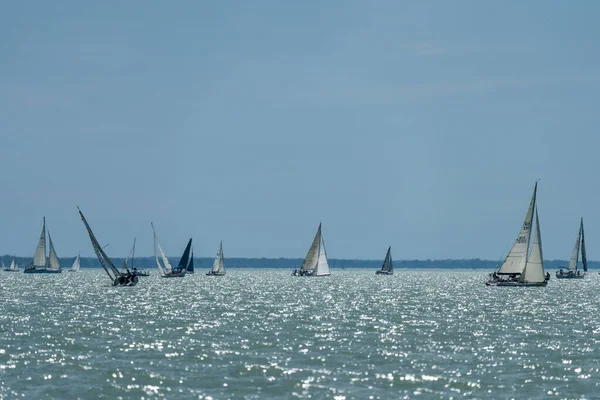 TIHANY - JULY 14 : Sailing boats compete on 54.th Kekszalag championship at the Lake Balaton on 14 July 2022 in Tihany, Hungary.