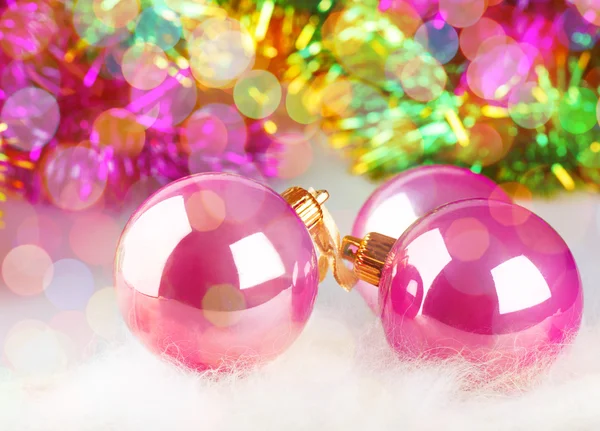 Greeting card with Christmas balls on colorful background — Stock Photo, Image