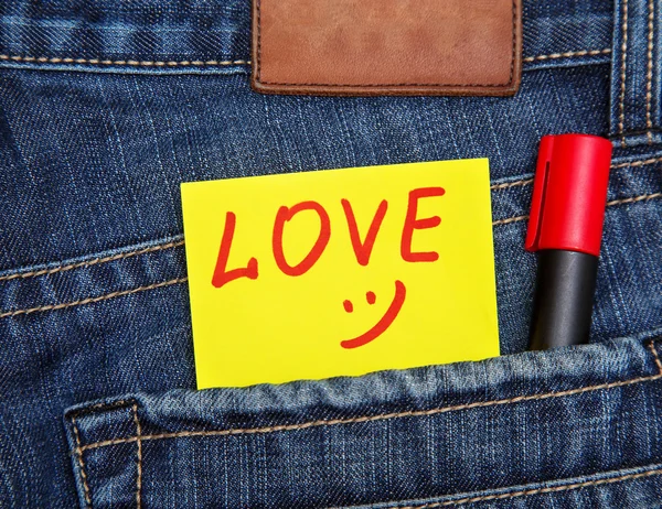 Valentine's day card in jeans pocket — Stock Photo, Image