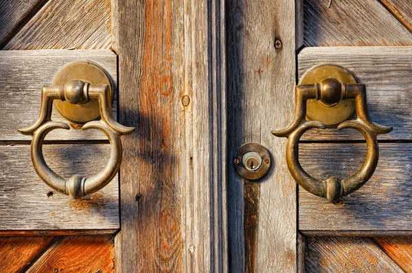 Old brass door handles — Stock Photo, Image