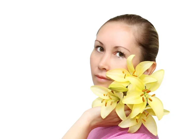 Pretty face of beautiful young woman with lily - white background — Stock Photo, Image