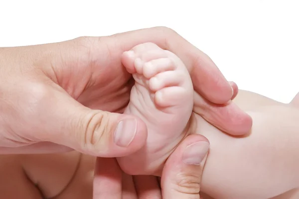 Mano dell'uomo e piede dei bambini — Foto Stock