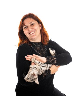 bengal cat and woman in front of white background