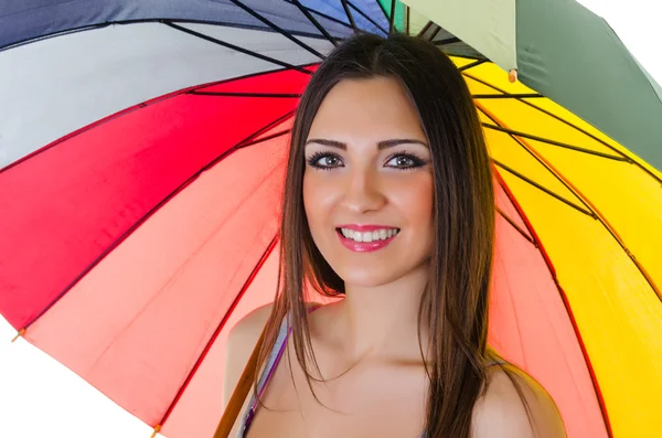 Frau mit Regenbogenschirm — Stockfoto