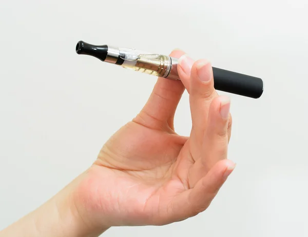 Electronic cigarette in hand — Stock Photo, Image