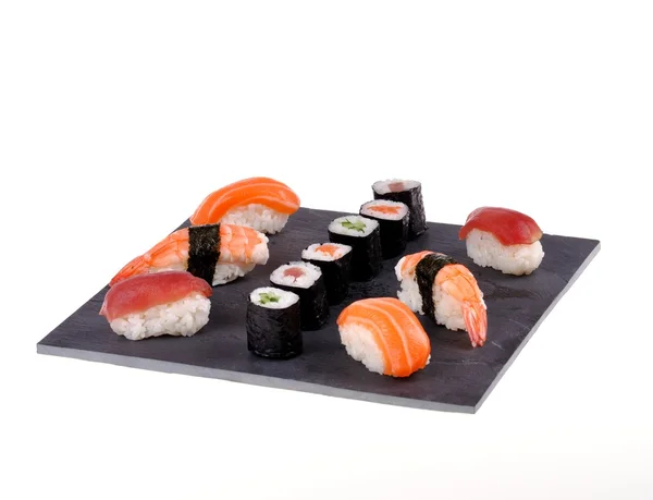 Placa de sushi sobre fondo blanco — Foto de Stock