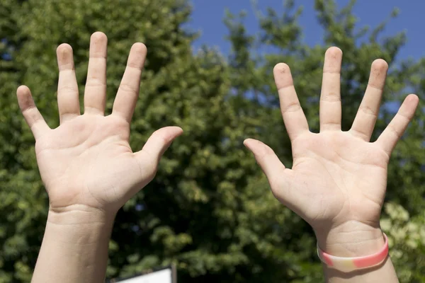 Hands forming sign — Stock Photo, Image