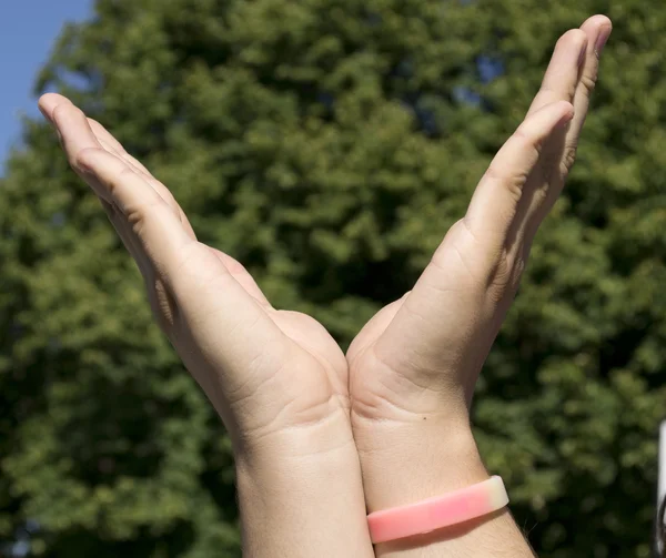 Manos formando signo — Foto de Stock