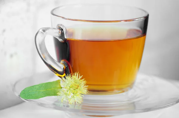 Glass cup of tea with linden — Stock Photo, Image