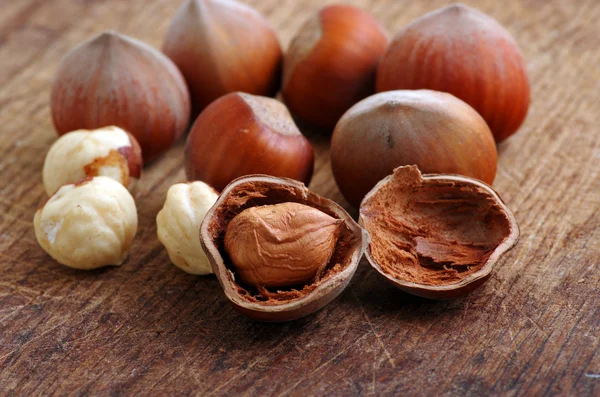 Hazelnuts, filbert on old wooden background — Stock Photo, Image