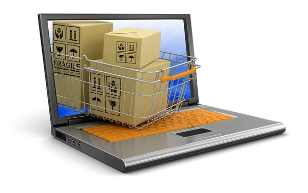 Laptop, Cesta de compras e pacotes — Fotografia de Stock