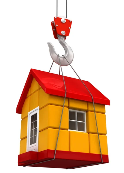 Żuraw podnosi dom — Zdjęcie stockowe