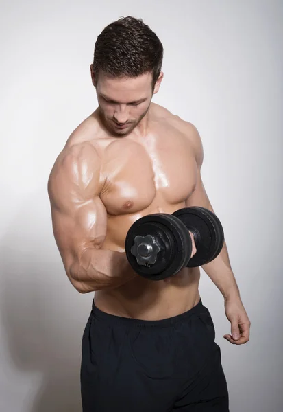 Bonito muscular jovem — Fotografia de Stock