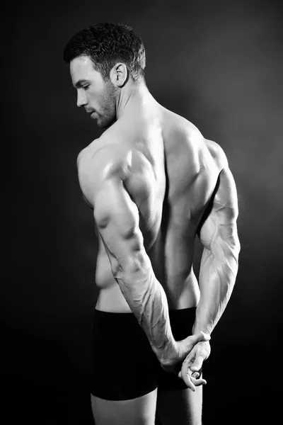 Mięśni mężczyzna powrót — Zdjęcie stockowe