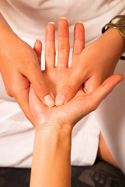 Massaging a palm — Stock Photo, Image