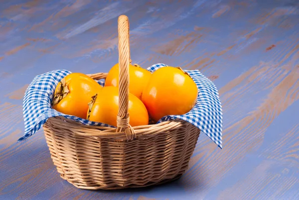 Persimmon basket — Stock Photo, Image