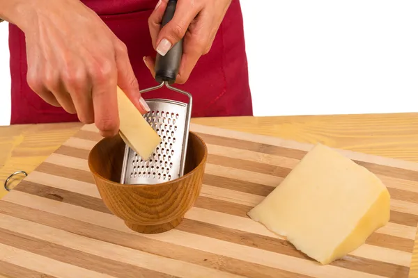 Grating cheese — Stock Photo, Image