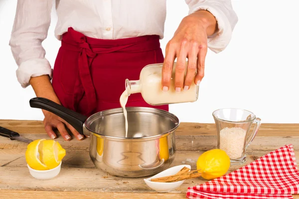 Pouring milk — Stock Photo, Image