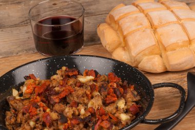 Migas with red wine clipart