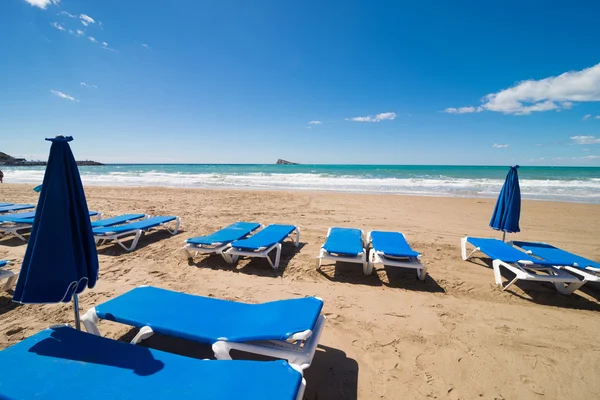 Deckchairs on Benidorm beach — Stock Photo, Image