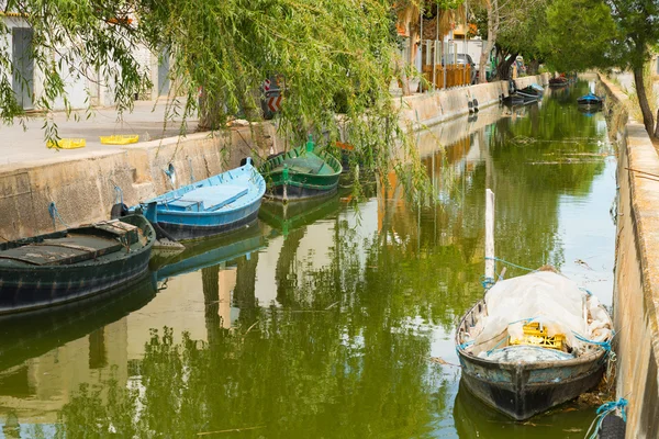 Canal and fishing boats — Stock Photo, Image