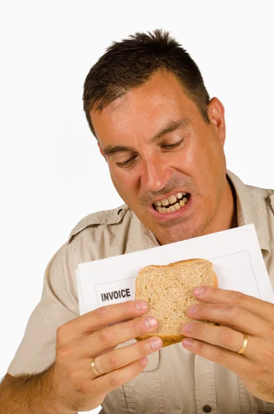 Eating a bill sandwich — Stock Photo, Image