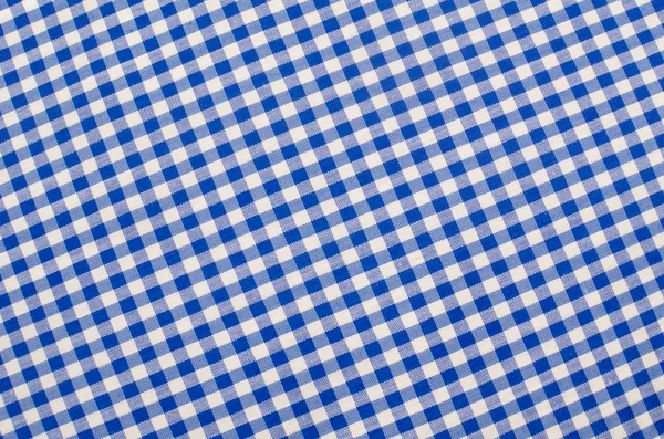Синьою тканиною — стокове фото