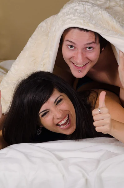 Couple under blanket — Stock Photo, Image
