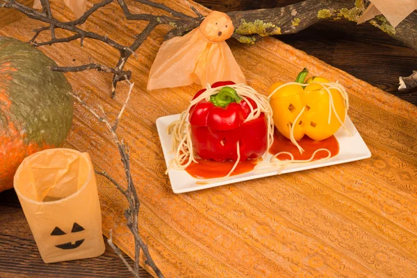Fake pumpkins with pasta worms — Stock Photo, Image